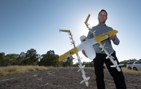 Wing chief executive James Ryan Burgess, pictured above with one of the quieter model drones.