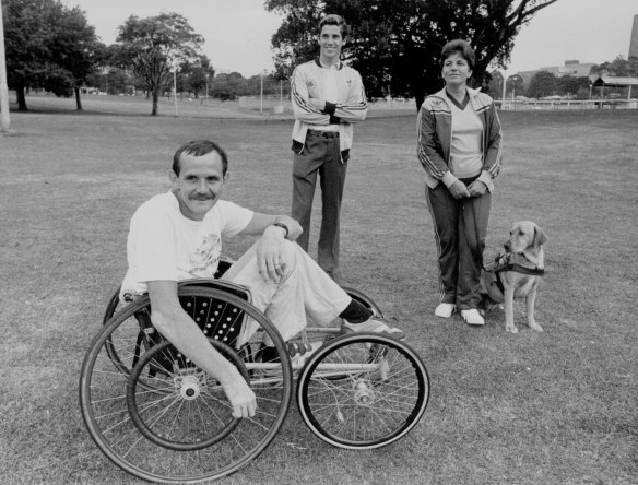 Unsung Heroes - Left to Right Richard Cordukes (wheelchair) of Lidcombe, Les Beath (15) of Auburn and Marilyn Mills and Guide dog Harriet of Caringbah. 