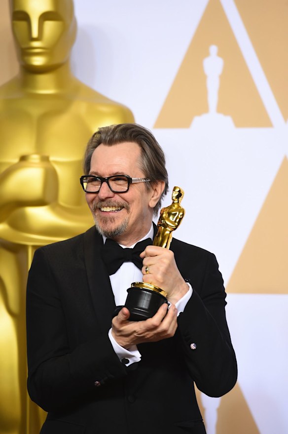 Gary Oldman, winner of the award for best performance by an actor in a leading role for <i>Darkest Hour</i>, poses in the press room.