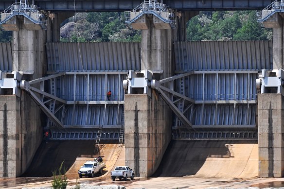 Work crews at the gates of Wyangala Dam: the business case for lifting the wall is yet to be made public.