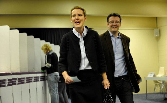 Kelly O'Dwyer and husband Jon Mant after filling in their voting slips at the Toorak South Yarra Library polling booth during the Higgins byelection in 2009. Photo: Justin McManus
