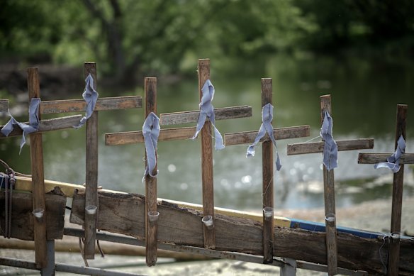 Memorial crosses adorn the remains of the bridge over the Irpin River on May 16, where thousands of residents made their precarious escape from the Russian invasion. The bridge is now an official memorial to those who lost their lives in the battle for Irpin and Bucha. 