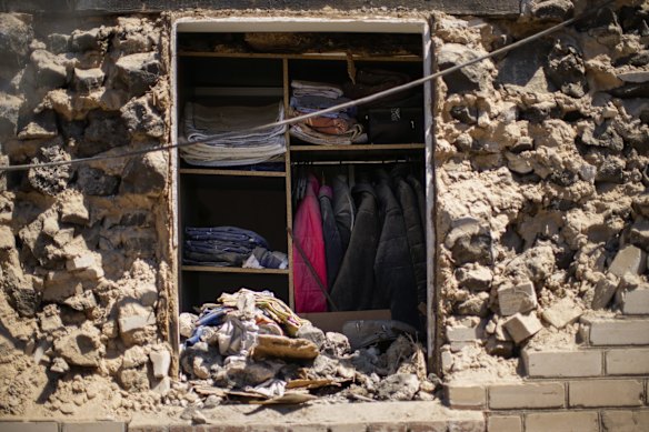 Clothes hung in a closet of a destroyed house after a Russian rocket, hit by Ukraine's anti-aircraft system, stroke in a residencial area in Zaporizhzhia. The strike came as parts of southern Ukraine prepare for a further advance by Russian forces who seek to strip the country of its coast.