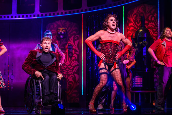 Dylan Alcott (left) as the narrator with Jason Donovan doing the Rocky Horror signature dance, the Time Warp.