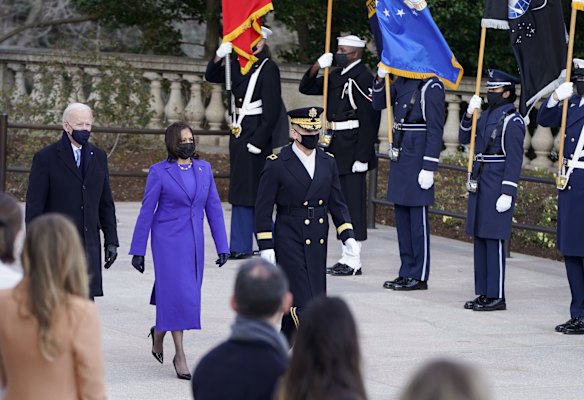 President Joe Biden and Vice President Kamala Harris and Maj. Gen. Omar J. Jones attend a wreath laying at the Tomb of the Unknown Soldier at the Arlington National Cemetery, in Arlington, Va., Wednesday, Jan. 21, 2021. (Joshua Roberts/Pool photo via AP)