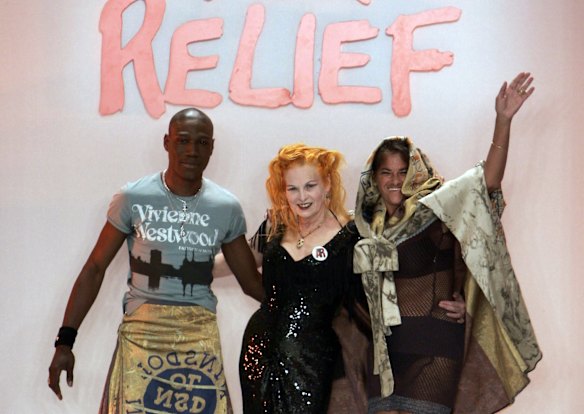 British fashion designer Dame Vivienne Westwood, center, with British artist Tracey Emin, right, and a model, left, on the catwalk at the Fashion For Relief show, during London Fashion Week at the Natural History Museum in central London, Wednesday Sept. 17, 2008. 