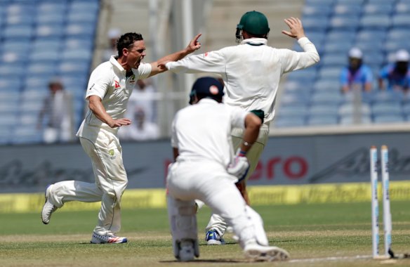 Steve O'Keefe celebrates after Virat Kohli's wicket.