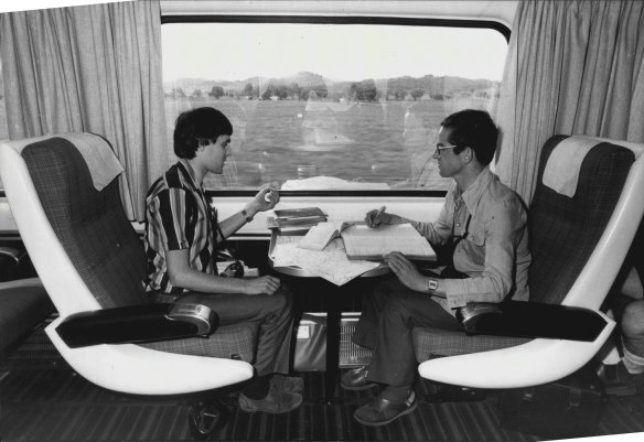 “We were two minutes early at Lithgow, on time at Bathurst.” Graham Davis, right, and his logbooks.