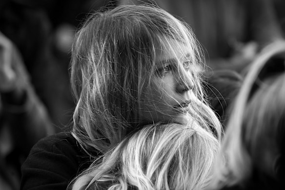 Faces of Paris. Parisians silently paid respect to the 129 people killed in the terror attack in Paris across many memorial sites including Le Carillon bar.