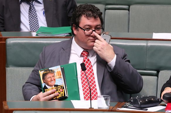 Mr Christensen with a copy of Donald Trump's policy manifesto, Time to Get Tough, after the American's election victory.