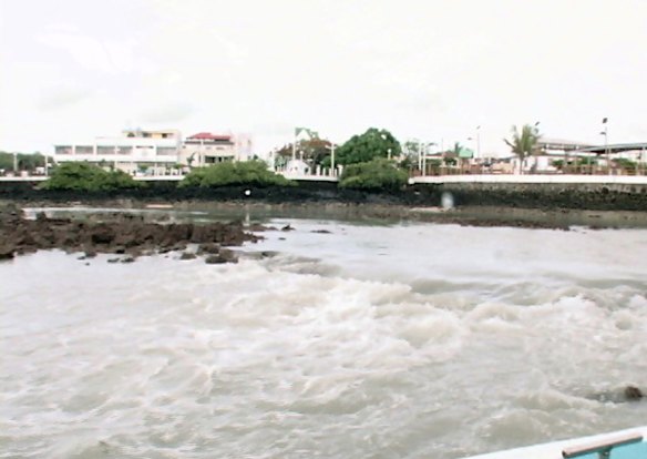 Sea water rushes into the port area of Port Ayora, Galapagos Islands, due to the tsunami generated by the Chilean earthquake.