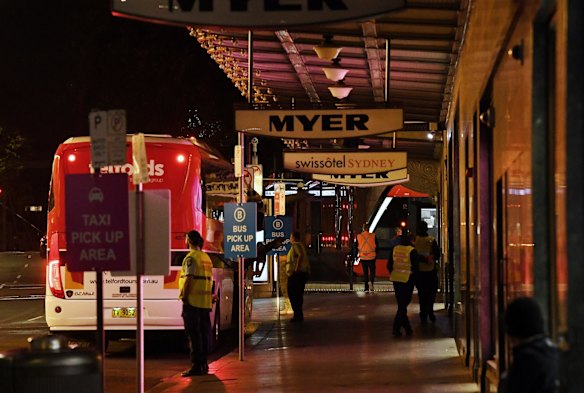 A line of buses outside the Swissotel to transport people who have been in quarantine.
