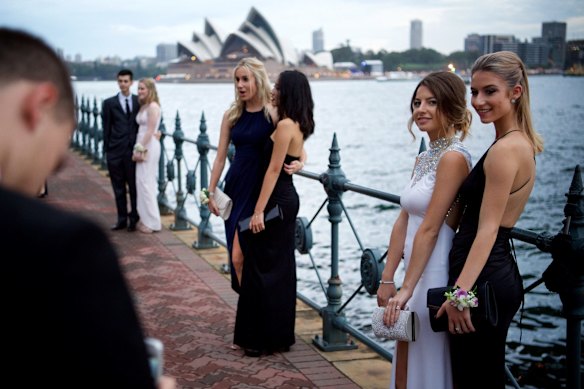Year 12 students from Killara High School gather at Milsons Point before their formal at Luna Park, 2015.