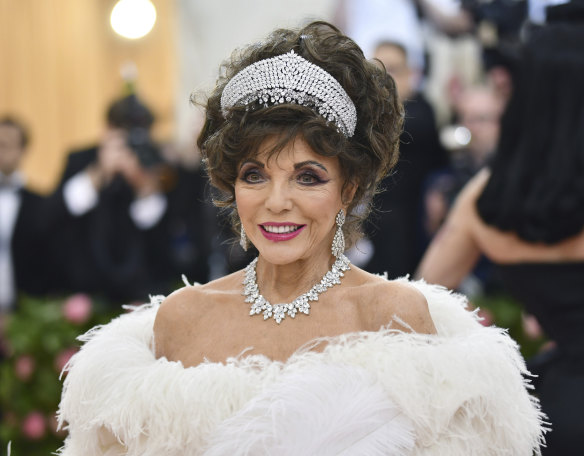Joan Collins adding a regal touch to the Met Gala.