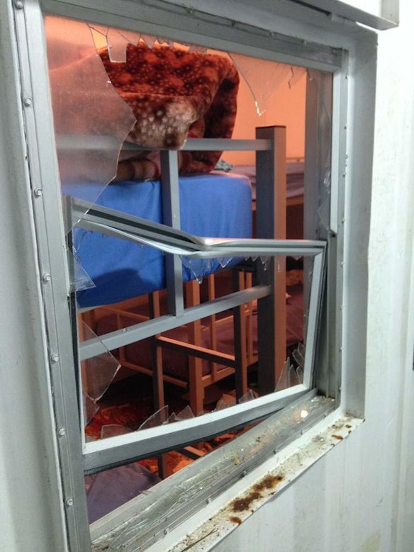 Manus Island scenes of where Asylum seekers are detained before and after recent riots. Damage due to locals trying to force entry.