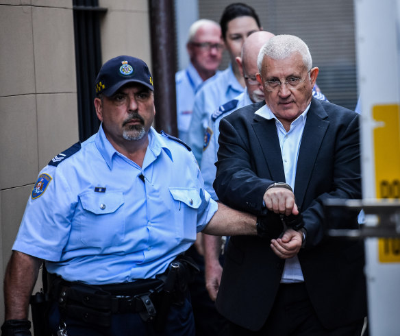 Millionaire property developer Ron Medich is escorted into a NSW Corrective Services van at the NSW Supreme Court in Sydney on Monday.