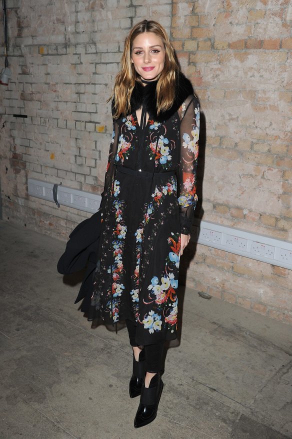 Olivia Palermo combines a sheer sleeve with an ankle boot for a strong finish.