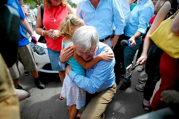 Prime Minister Kevin Rudd hugs Virginia Rudd at the Parap markets in Darwin.