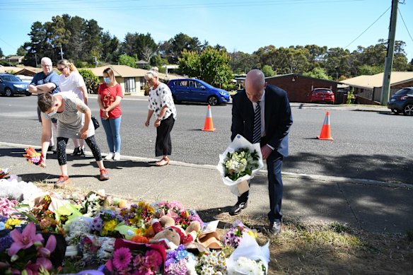 Tasmanian Premier Peter Gutwein, Deputy Premier Jeremy Rockliff and Devonport Mayor Annette Rockliff were among those visiting HillCrest Primary school on Friday to comfort mourners and lay flowers by the makeshift memorial at the school's gates.