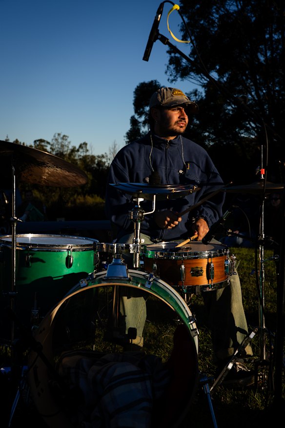 Danny Rispler plays drums during the Sydney Park gig.