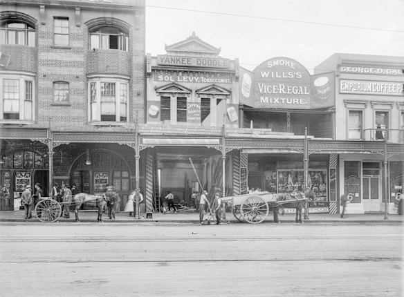 709-715 George Street, c1912. Sol Levy and his family manufactured hand-rolled cigars using imported tobacco from the early 1890s. When this photograph was taken, the family-run tobacconist business was in the process of moving next door to number 713, where they remained until 2015. Sol Levy specialised in pipes and cigars, and there was a barber's saloon on the premises until the early 1990s.