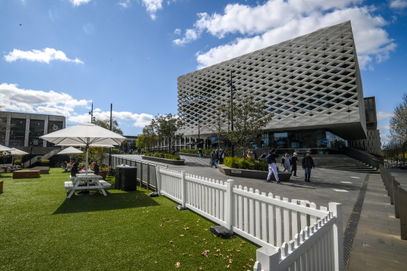 The 2016 redevelopment of Eastland included a new town square and library. 