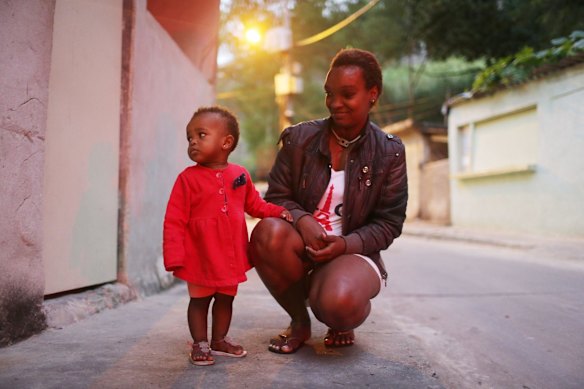 Locals in the Mangueira favela. Much of the Mangueira favela community sits about a kilometre away from Maracana stadium, site of the opening and closing ceremonies for the Rio 2016 Olympic Games..