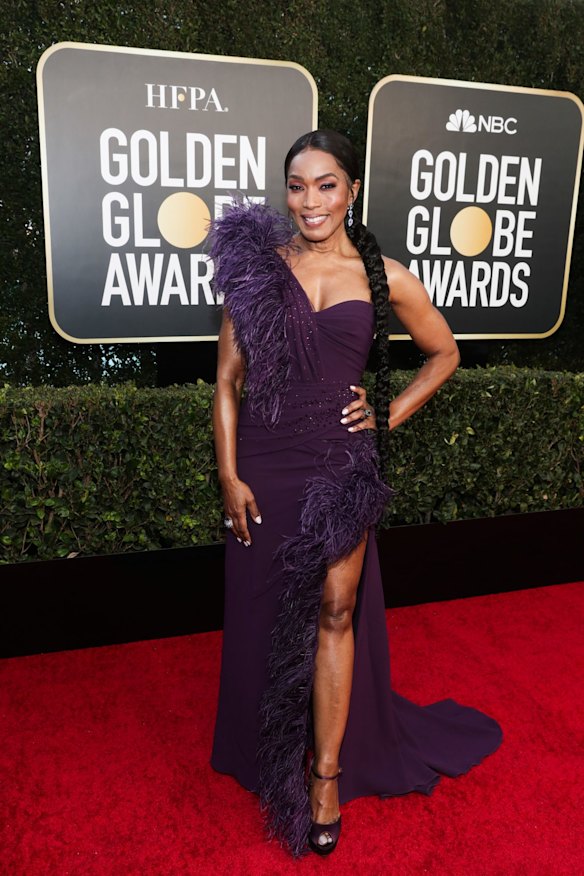 Angela Bassett wears Dolce & Gabbana.