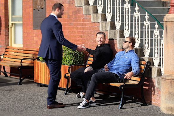 Cordner talks to former teammates Todd Carney and Wade Graham outside the SCG.