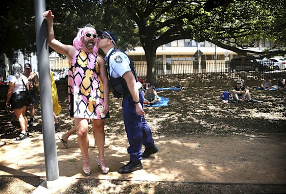 A police officer gets into the spirit of things at the Gay & Lesbian Mardi Gras Fair Day at Victoria Park, Sydney. 
