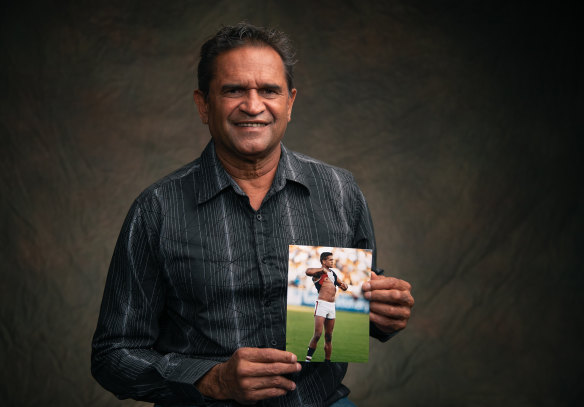 St Kilda great Nicky Winmar is at the centre of a debate around whether he’ll be a co-lead plaintiff in a racism class action.