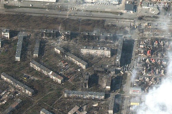 A satellite image showing damaged and burned apartment buildings in Mariupol, Ukraine.