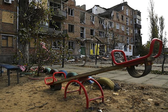 The playground at the front of the apartment that was hit by a missile on October 13. Artem, 11, was trapped in the ruins for seven hours before being rescued, but later died from his injuries.