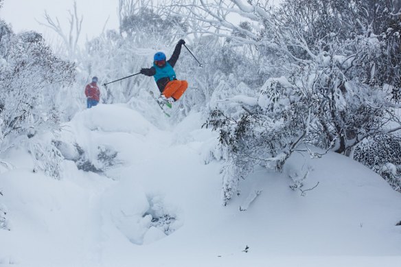 Skiers getting some good air up on Thredbo.