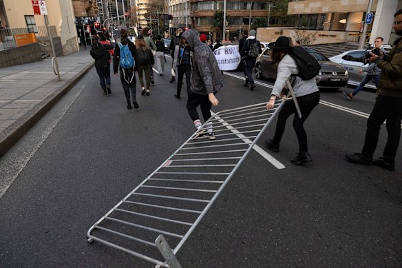Protestors against climate inaction moved around the Sydney CBD stopping traffic. 