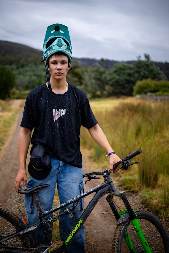 Ollie, 15, poses for a portrait while waiting for the Red Bull Hardline Tasmania final event at Maydena Bike Park, Tasmania. The final event was eventually cancelled due to weather and safety concerns.