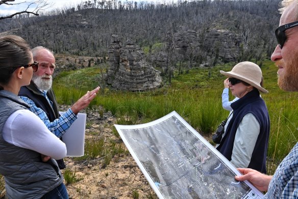 Chris Jonkers (second from left), the vice president of the Lithgow Environmental Groups, takes visitors include the MPs to one of the swamps in the Gardens of Stone area.