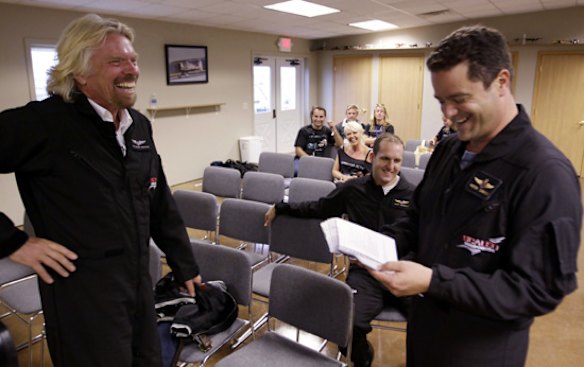 Richard Branson shares a laugh with Pilot Pete Siebold during pre flight training for WhiteKnightTwo.
