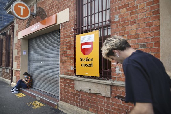 Commuters stranded at Redfern Station on Monday after the network was closed.