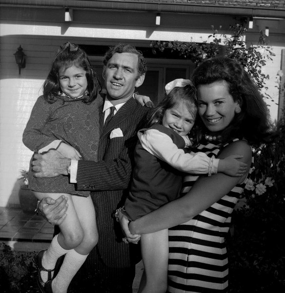 Andrew Peacock  is the youngest man ever appointed to the Federal Minister. He is with his wife Susan and two of their three children, Caroline, 5, left and Anne, 4.