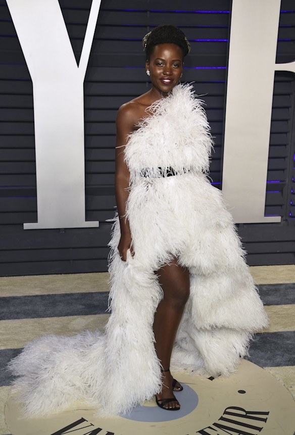 Lupita Nyong'o arrives at the Vanity Fair Oscar Party in Beverly Hills, California.
