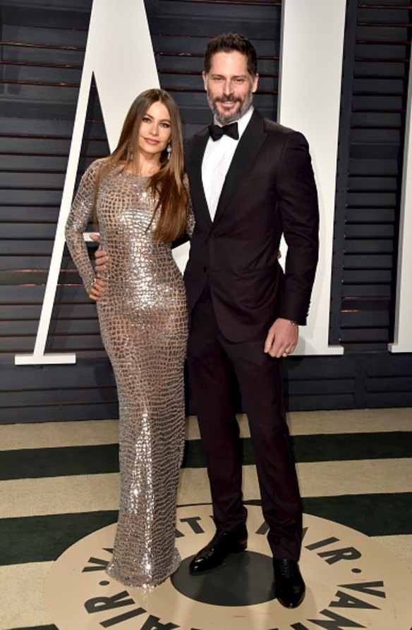 Sofia Vergara also brought sparkles to the Vanity Fair carpet with a long-sleeve skin tight nude and silver Michael Kors number, posing with husband Joe Manganiello.