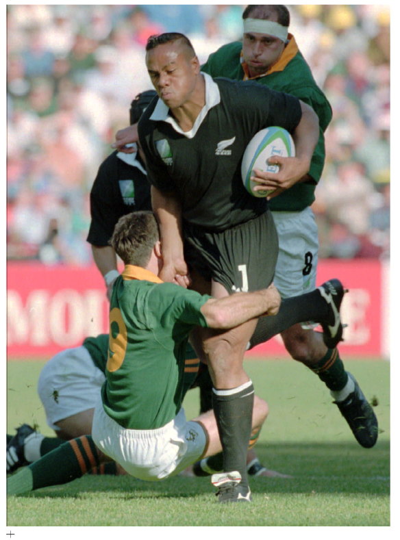 New Zealand winger Jonah Lomu is tackled by South Africa’s Joost van der Westhuizen during the World Cup final against South Africa at Ellis Park in Johannesburg,