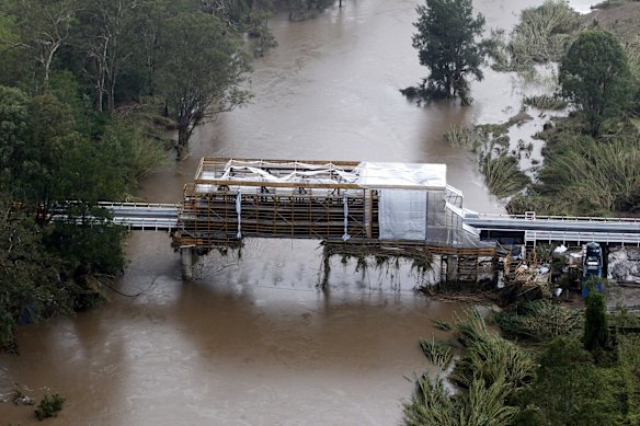 Hunter Valley flooding showing, a bridge under repair, damaged by floods near Paterson.