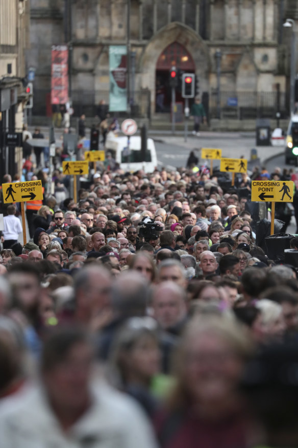 People queue to enter St Giles’ Cathedral. 