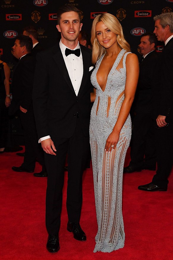 Marc Murphy of Carlton (L) and partner Jessie Habermann arrive ahead of the 2016 Brownlow Medal at Crown Entertainment Complex on September 26, 2016 in Melbourne, Australia.