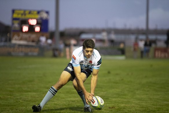 The Waratahs' Ben Donaldson knocks on during a Super Rugby trial match against the Brumbies. 