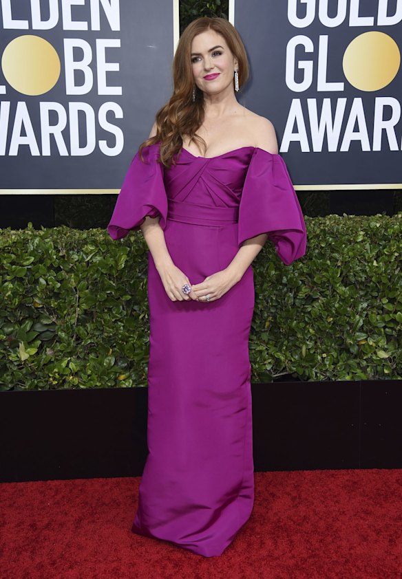 Isla Fisher arrives at the 77th annual Golden Globe Awards.