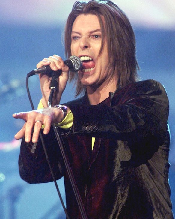 <i>Rebel Rebel</i> ... Bowie after receiving the Legend Award at the WB Radio Music Awards show in 1999.