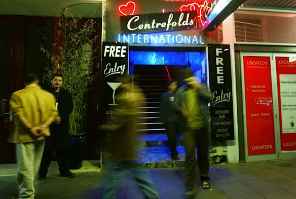 Doug Kilner outside Centerfolds International, formerly known as Playbirds on a slow Tuesday night, 2005. 